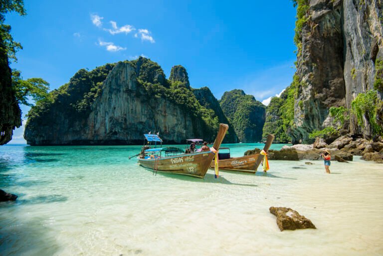 View of thai traditional longtail Boat over clear sea and sky in the sunny day, Phi phi Islands, Thailand